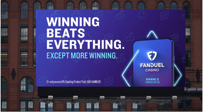Billboard showing Winning Beats Everything FanDuel ad