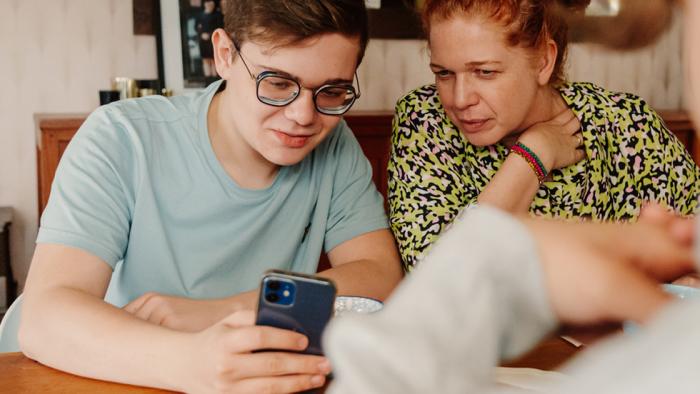 Teen and parent talking