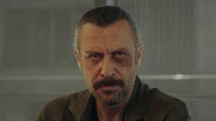10 Days of a Curious Man Movie: A man looks unhappy or menacing