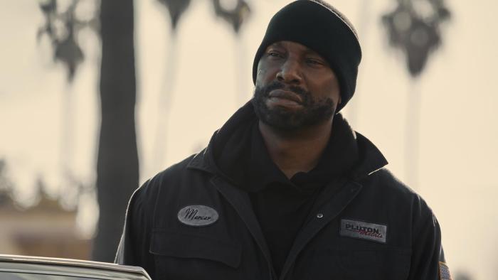 1992 movie: Tyrese Gibson wears his factory uniform, looking off screen