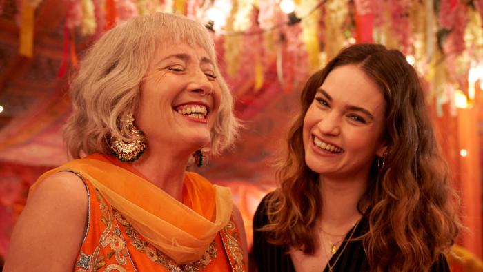 What's Love Got to do With It?: A young White woman and her mother smile together 