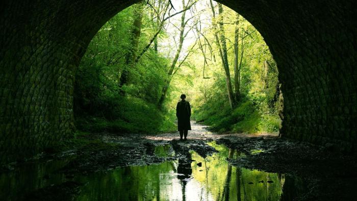Men: Silhouette of man in tunnel