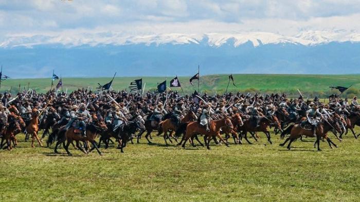 A Legend: Soldiers on horse back holding flags and swords