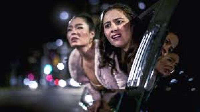 Abducted on Prom Night: Young women look perplexed leaning out car door