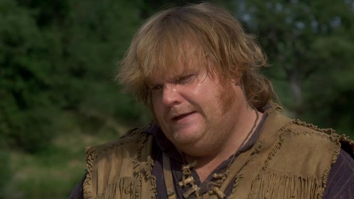 Almost Heroes movie: Chris Farley with floppy blond hair center looks like a fur trapper