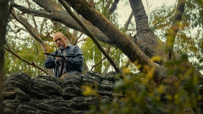 Apex: Taron Egerton with an arrow shooter.