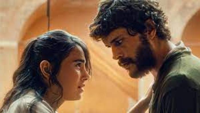 Ashes: a woman and man face each other