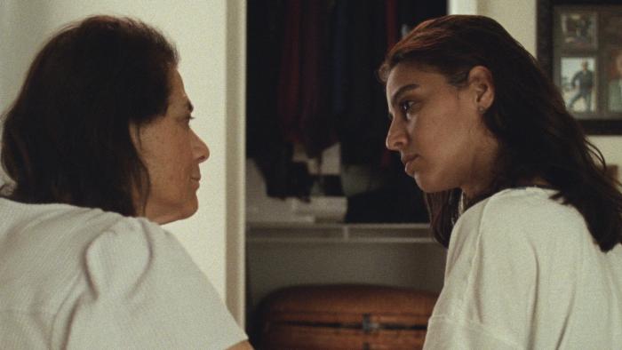 Atonement movie: Iraqi mother and daughter talk in a hallway