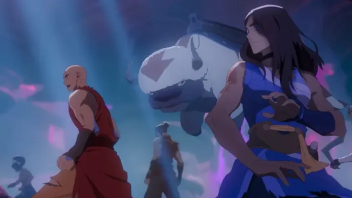 Avatar Aang The Last Airbender Movie: Toph, Aang, Zuko, Appa, Katara and Sokka on fighting stances in a mystical, glowing cave with beams of light.