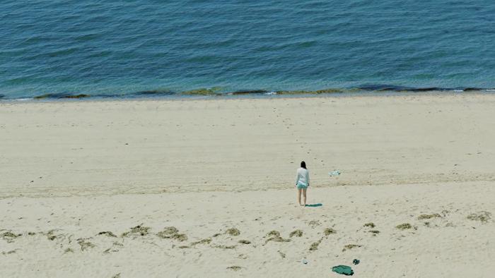 The Beach House Movie: Emily on the beach