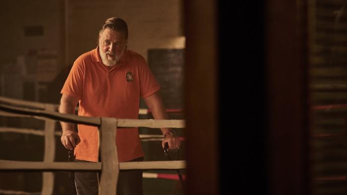 Beast Movie: Leaning on two canes, trainer Sammy (Russell Crowe) stands in his gym as if pondering something