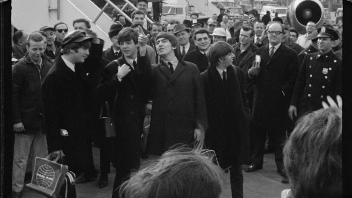 Beatles '64: The band in a crowd.