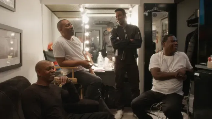 Being Eddie: Eddie Murphy with other comedians behind the scenes at SNL.