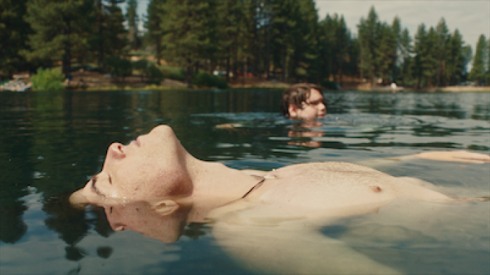 Big Boys: Boys float in the lake.