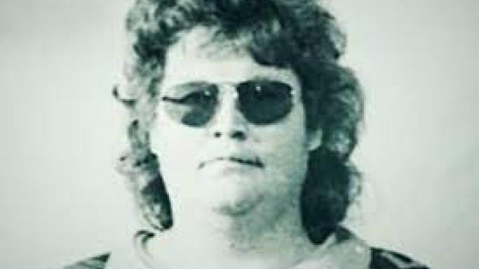 Big Mack: Gangsters and Gold: black and white image of person wearing sunglasses