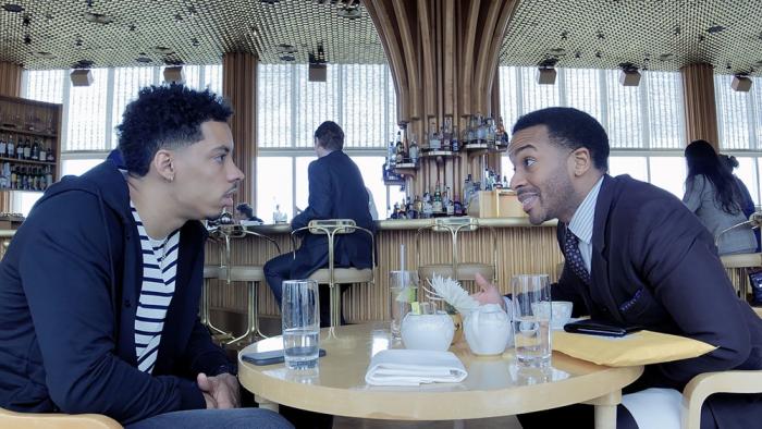 High Flying Bird Movie: Erick with Agent Ray