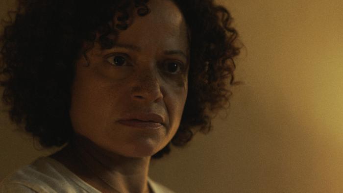 Birth/Rebirth Movie: Celie (Judy Reyes) looks at someone off camera and looks shocked or concerned