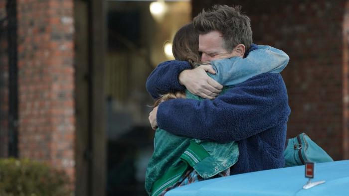 Bleeding Love Movie: Ewan McGregor gives a tight hug to his adult daughter outside of a rehab clinic
