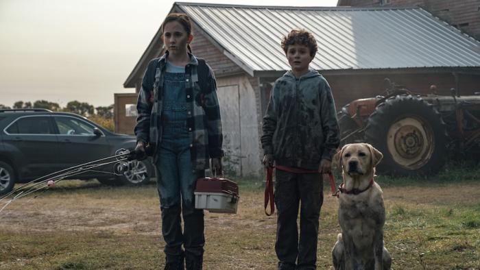 Blood Movie: Older sister Tyler, younger brother Owen, and dog Pippin stand, covered with mud