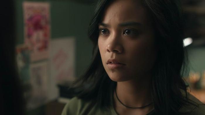 Bloody Axe Wound Movie: Abbie (Sari Arambulo) looks at someone with a concerned/disappointed expression