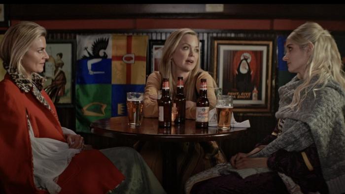 Blue Eyed Girl movie: Marisa Coughlan sits at a table full of beer bottles with Eliza Coupe and Ashley Jones