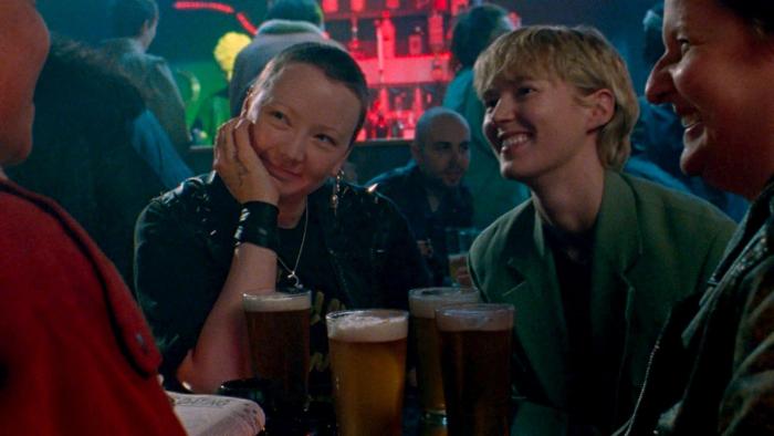 Blue Jean: Two White women are seen laughing and drinking with friends in a pub
