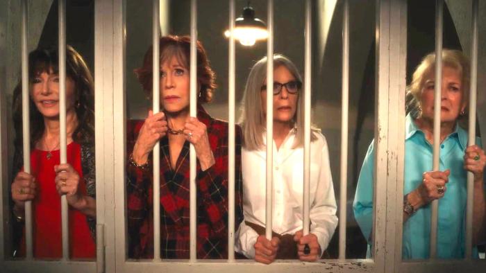Book Club: The Next Chapter Movie: Mary Steenburgen, Jane Fonda, Diane Keaton, and Candice Bergen look through the bars of a prison cell