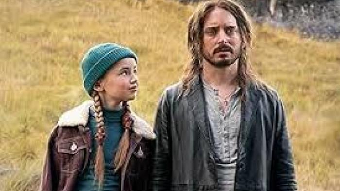 Bookworm movie: Mildred and Strawn stand in a field