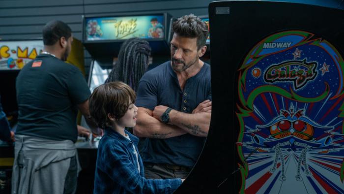 Boss Level Movie: Roy Pulver plays video games with his son Joe