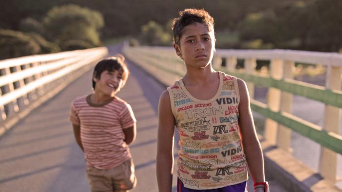 Boy Movie: Two kids walk on a bridge