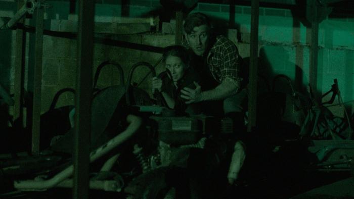 Cannibal Cabin: Jonah and Polly hide. 