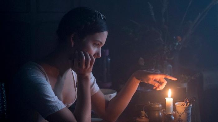Carmilla Movie: Lara with candle