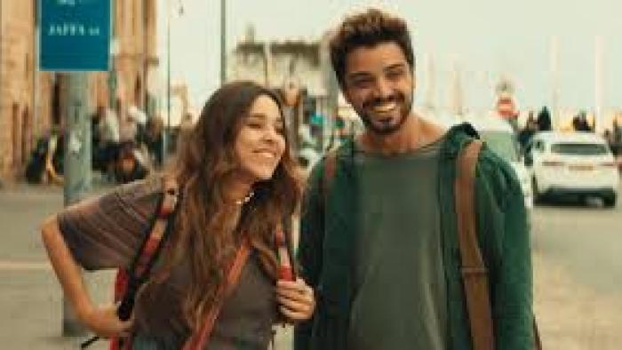 Cheers to Life: Man and woman smile outdoors