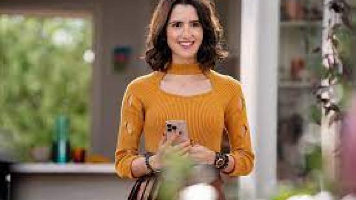 Choose Love: Laura Marano in a yellow top.