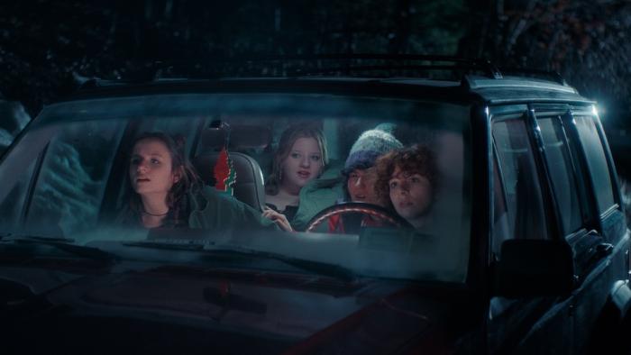 Christmas Eve in Miller's Point Movie: Teen Emily (Matilda Fleming) is in the passenger seat of a frosty car at night