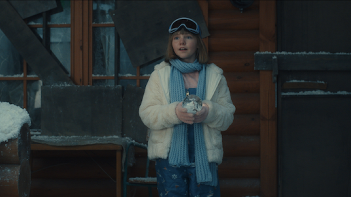 Claus Family 3: Amber Metdepenningen stands in a snowsuit.