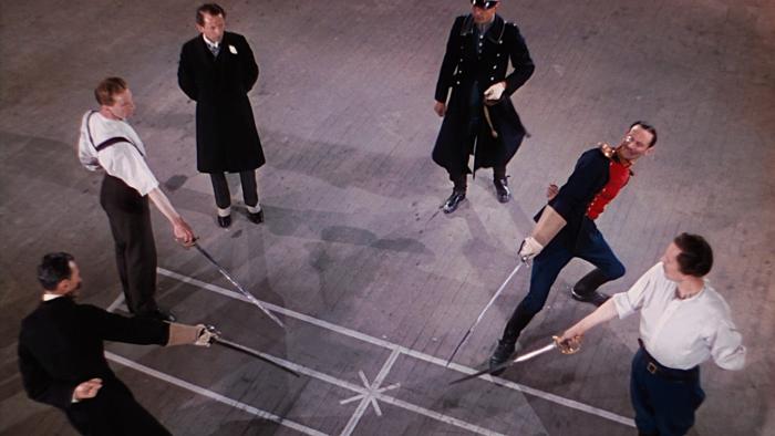 The Life and Death of Colonel Blimp: Roger Livesey and Anton Walbrook hold their swords out at the start of a duel