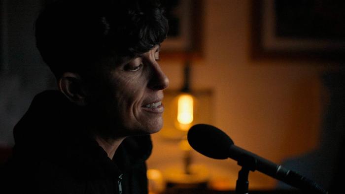 Come See Me in the Good Light movie: Andrea Gibson vocalizes a poem into a microphone