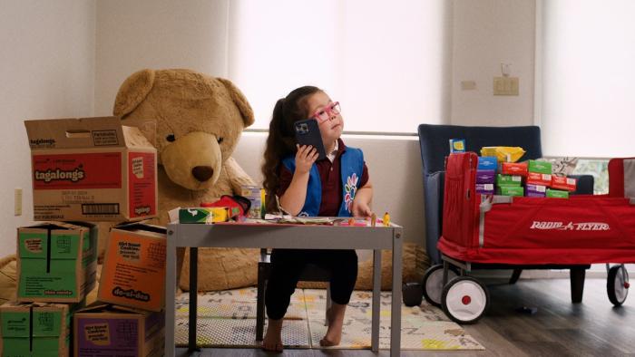 Cookie Queens movie: Ara practices her sales pitch