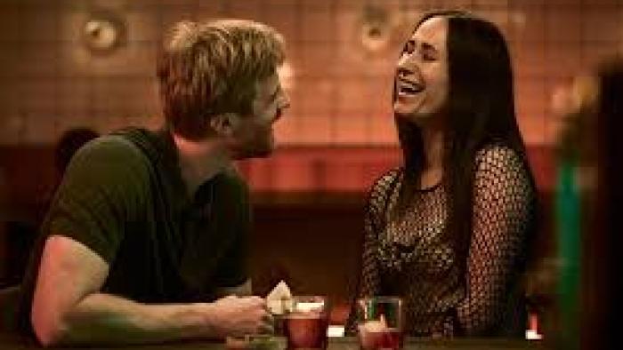 A Copenhagen Love Story: Couple laugh over drinks