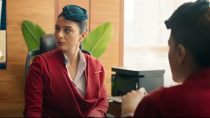 Crew: Two air hostesses talk to each other