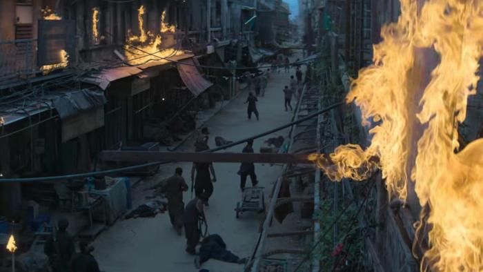 Dhurandhar The Revenge: Riots shown with people laying dead on the street as fire burns around them
