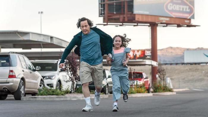  Daddy Daughter Trip scene 2: A father and daughter run through a parking lot