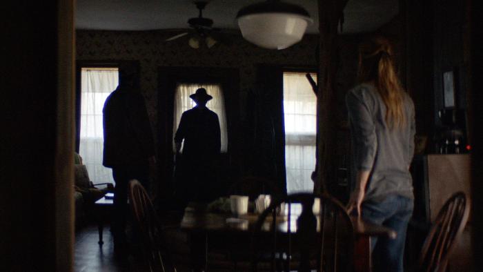 The Dark and the Wicked Movie: A shadowy figure at the door