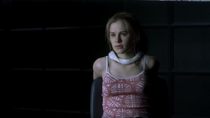 Darkness: Anna Paquin standing in the dark