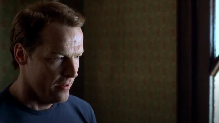 Darkness: Iain Glen stands in hallway