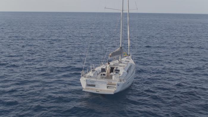 Deep Fear Movie: A wide view of Naomi's yacht in the ocean