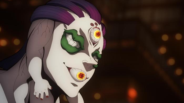 Demon Slayer - To the Swordsmith Village movie: A demon is shown, it has arms and tiny hands for ears, mouths where its eyes should be, and an eyeball on its forehead and one where the mouth should be
