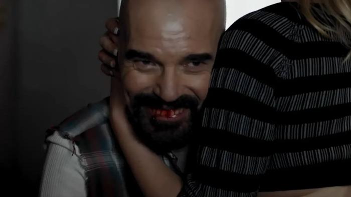 Devil's Peak Movie: Billy Bob Thornton being caressed while grinning with a bloody mouth