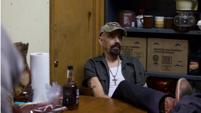 Devil's Peak Movie: Billy Bob Thornton props his feet up on a desk